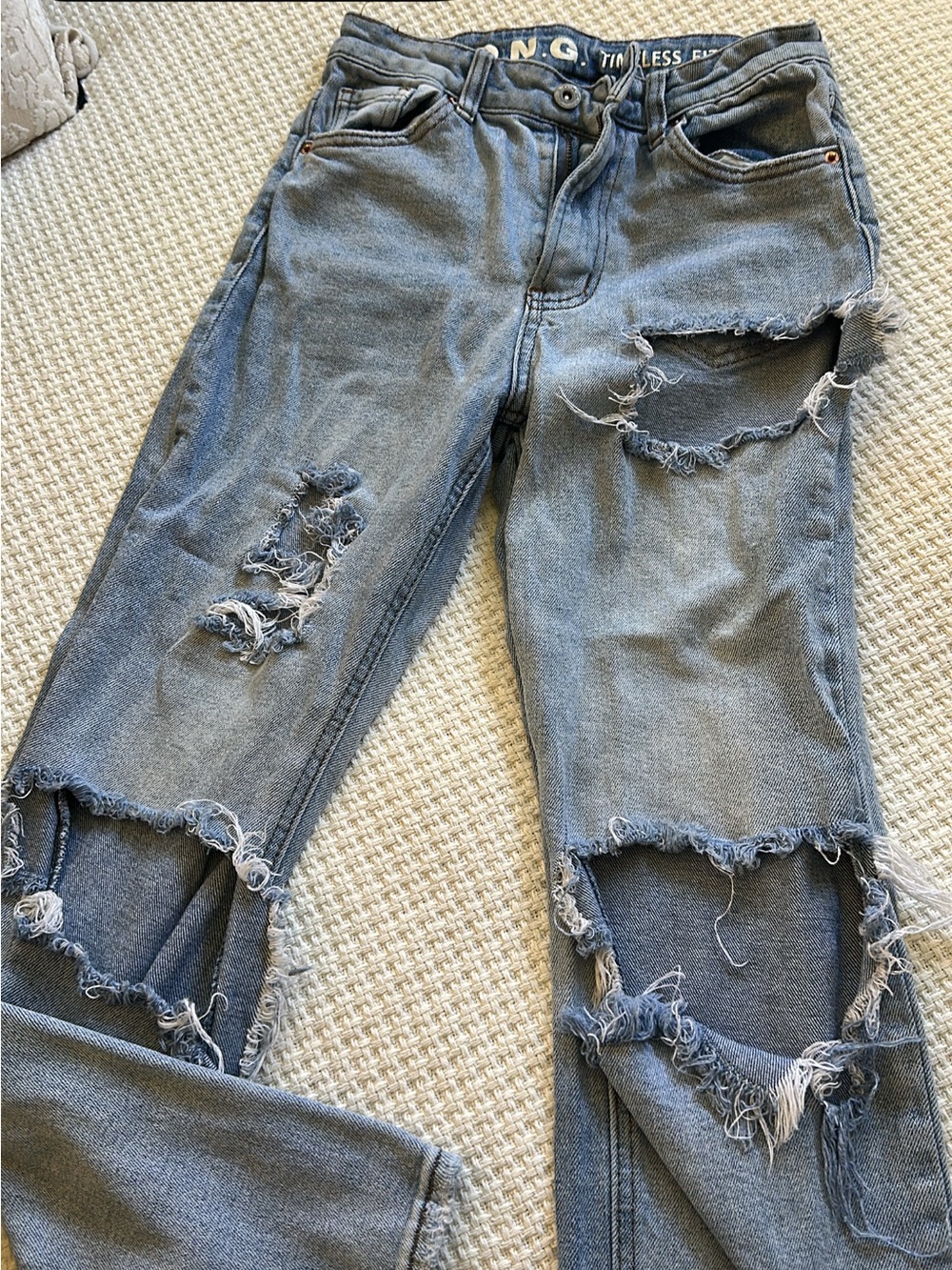 Distressed Boyfriend Jeans in Faded Blue